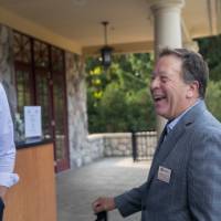 faculty enjoying a laugh